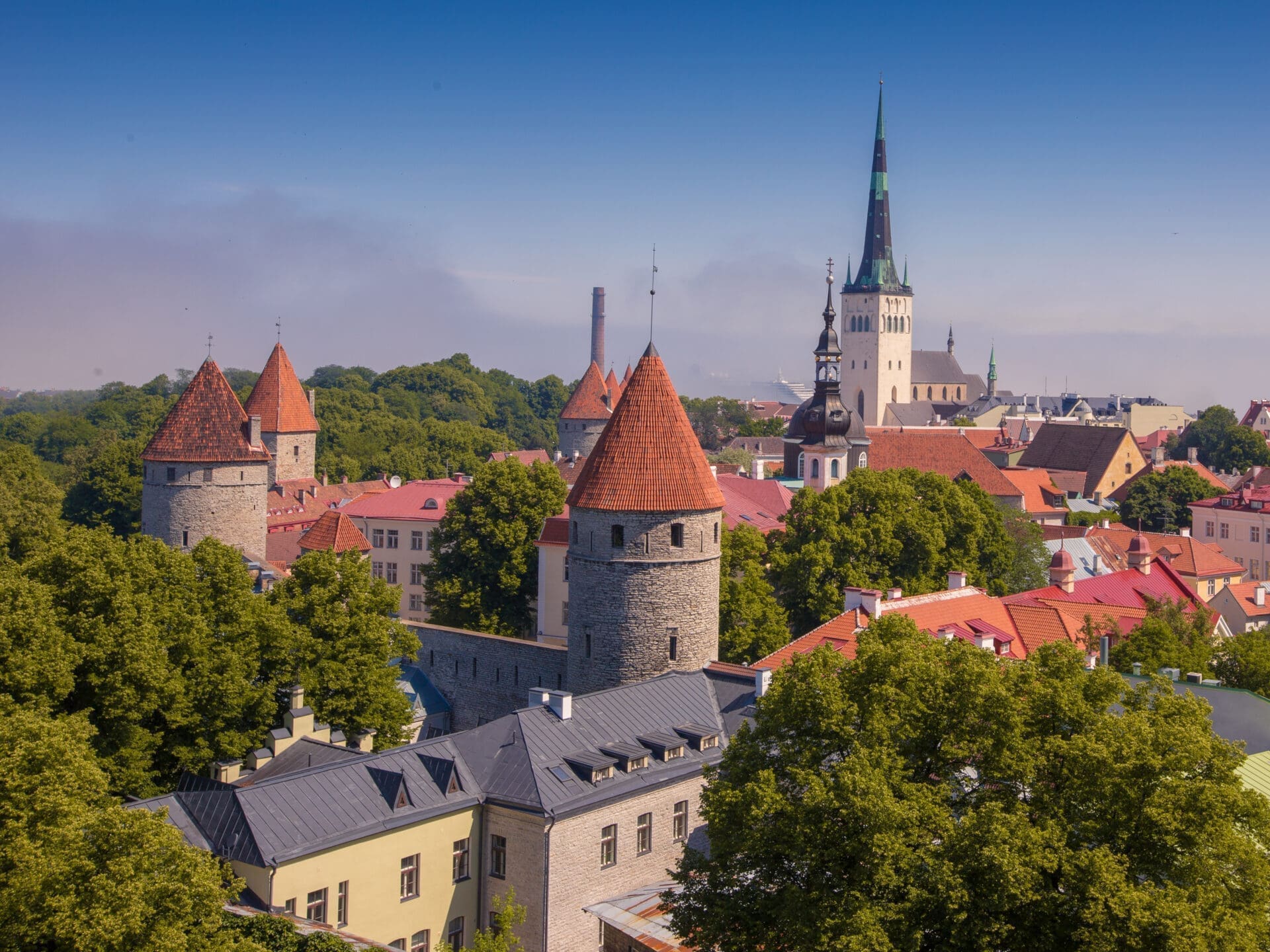 Cityscape of Toompea limestone hill in Tallinn, Estonia with a bright blue sky in the background Tours to Tallinn with IBG Travel
